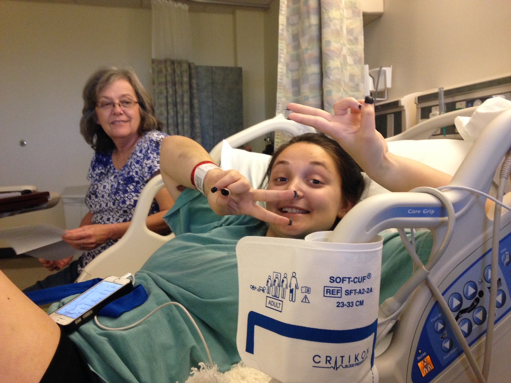 Emily recovering in the hospital after her car accident